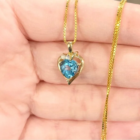 10K Swiss Blue Topaz heart cut cz petite elegant yellow gold open heart pendant - Picture 7 of 11
